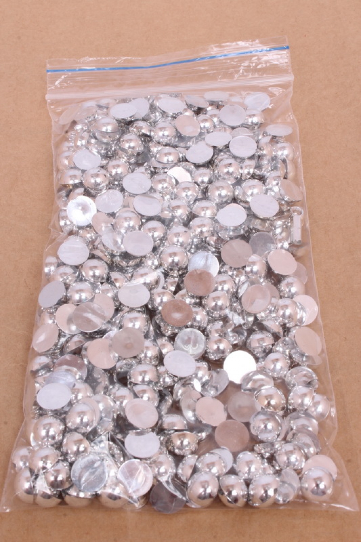 Бусины (А) полубусы серебро  (10мм) в пакете 100гр