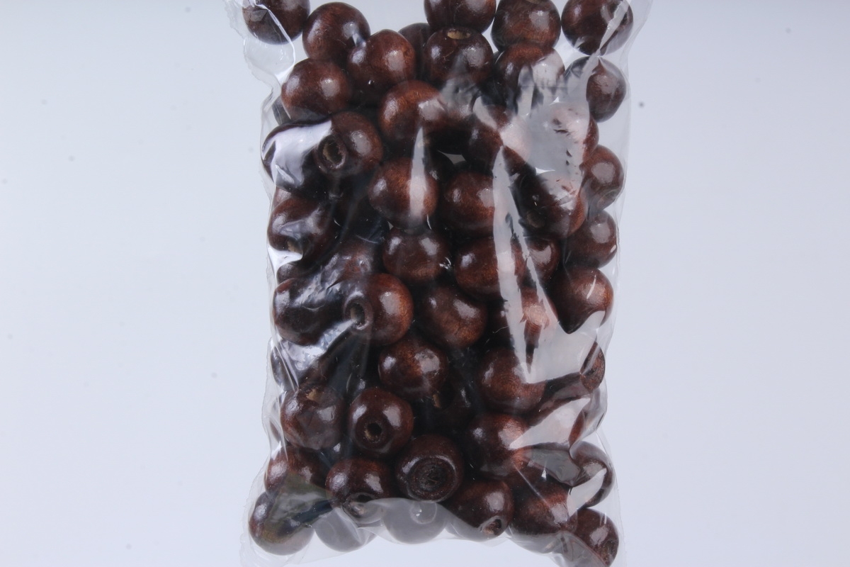 Бусины дерево  круглые коричневые (12мм) в пакете 50гр