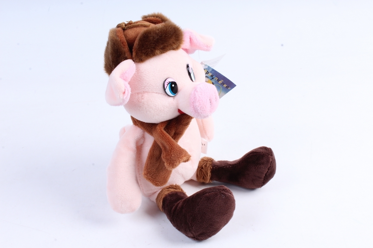 Игрушка мягкая (У) Поросёнок в ушанке 16см  Д-19506/16