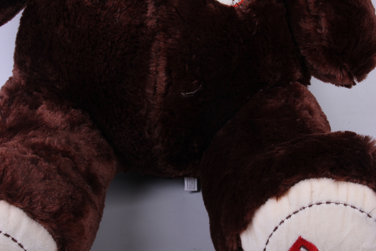 игрушка мягкая медведь с бантом коричневый аг-1652/50  h=50cm