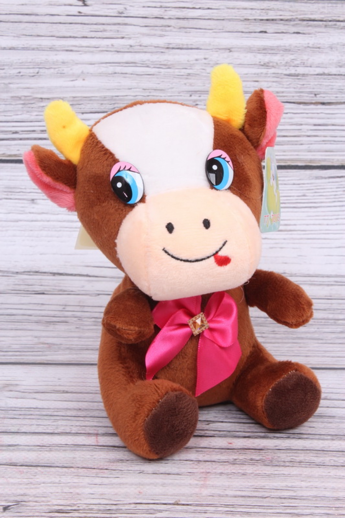 Игрушка мягкая (С) - Корова поющая в коричневая 20см  1020