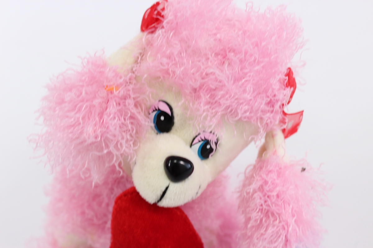 Розовый собака игрушка