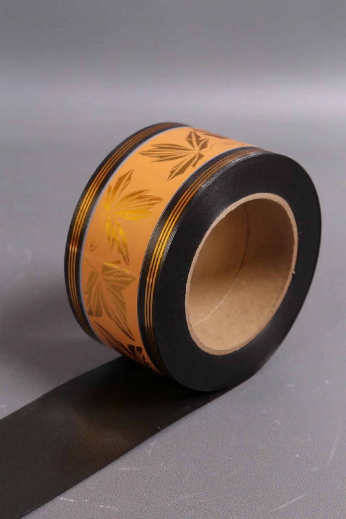 Лента с з/п ( 6см*50ярд) атласная С рисунком A685 БРОНЗОВЫЙ НА ЧЁРНОМ