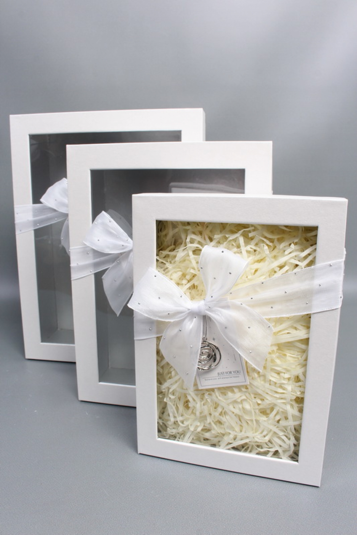 Набор коробок подарочных с бантиком из 3шт -  33,5*25*11,5, 29*21*9, 24,5*17*6,5, светло-серый 6358М