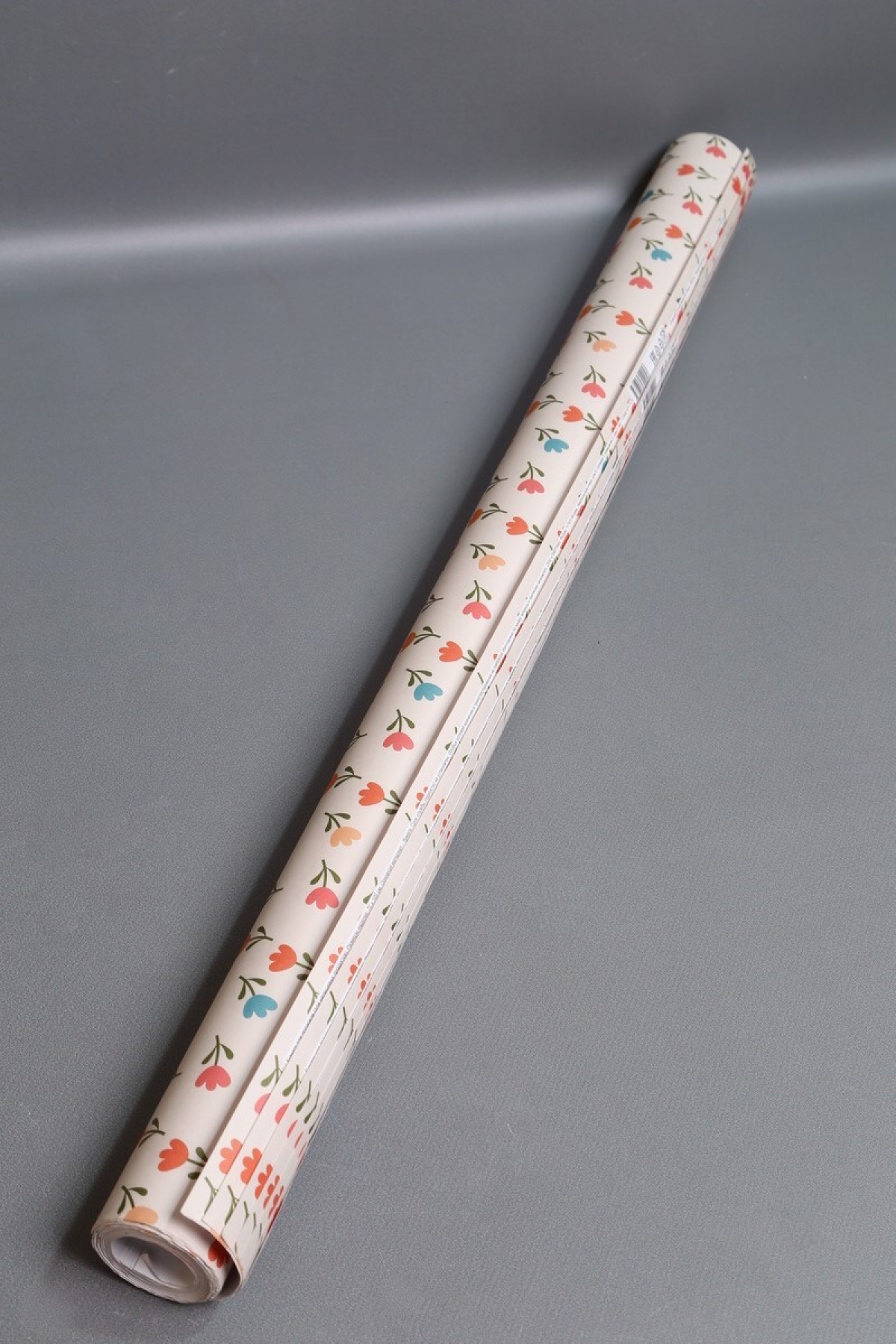 Подарочная упаковочная бумага "Цветочки" 1*0,7м (10 листов/рулон).70г/м2.  34310