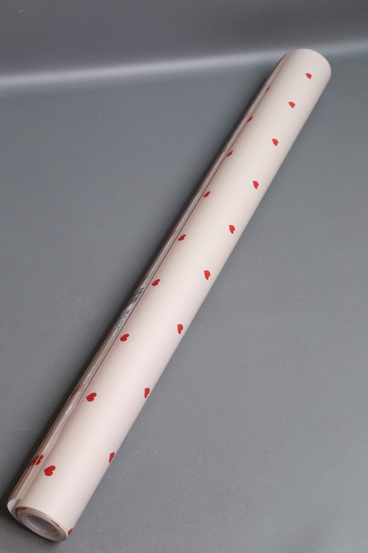 Подарочная упаковочная бумага "Сердечки" 1*0,7м (10 листов/рулон).70г/м2. 34312